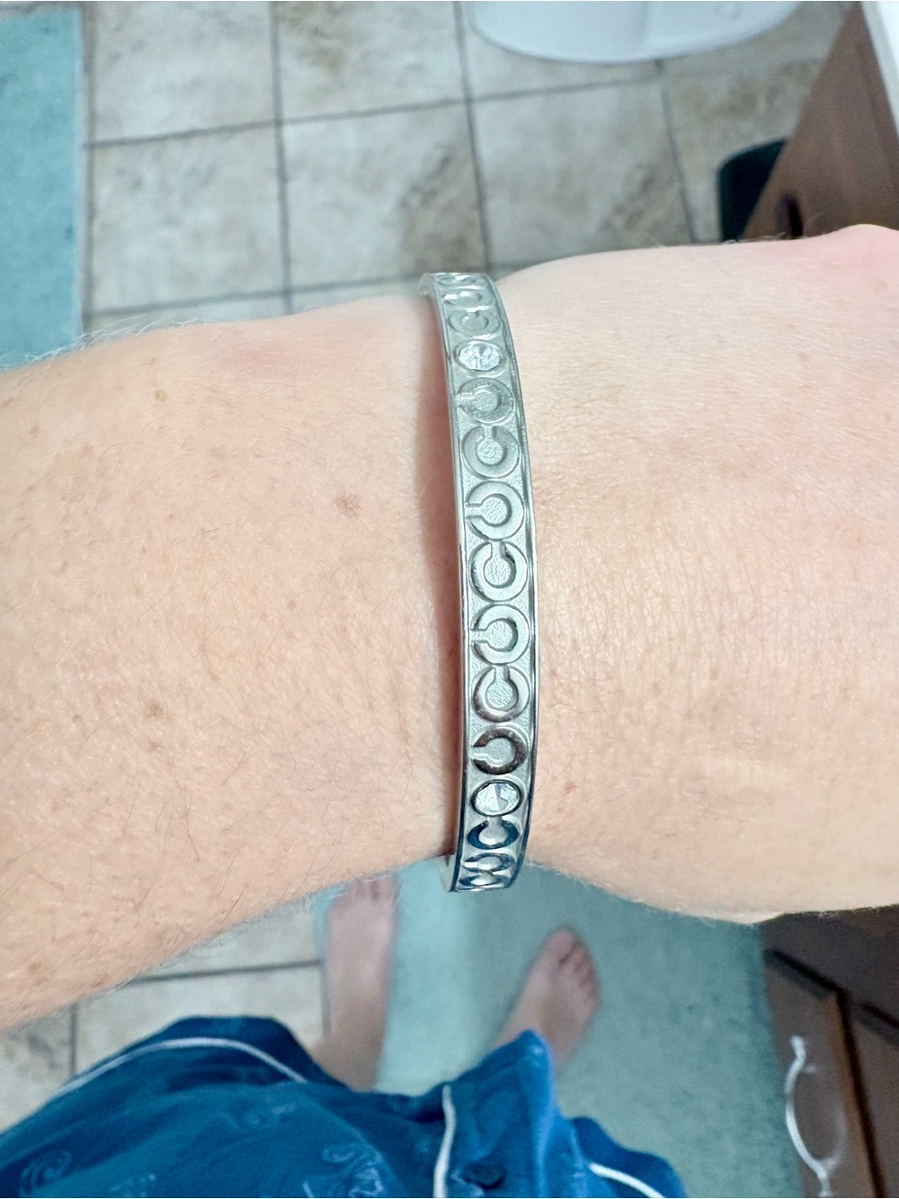 Coach Silver-Tone Signature Cuff Bracelet